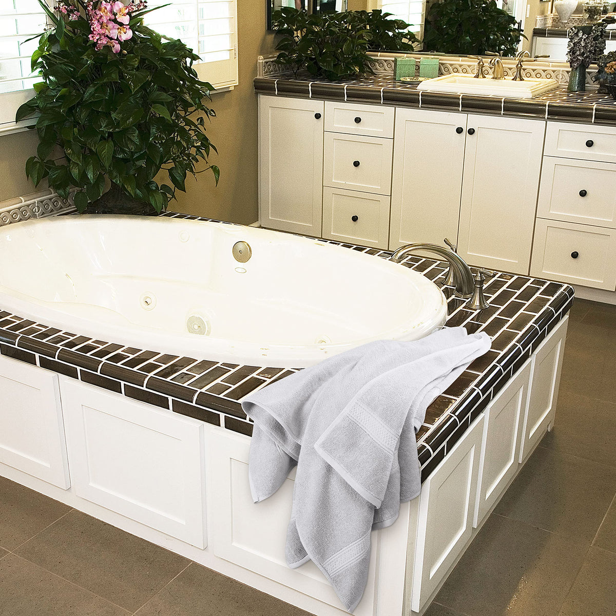 Care label shows warm wash and low heat tumble guidelines.
