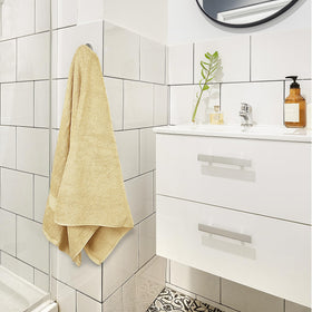 Utopia Towels 4 Pack beige packaging and towels ready for gifting or storage.