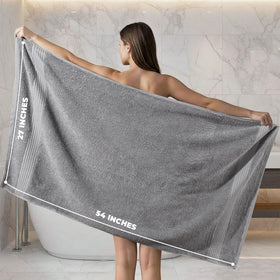 Utopia Towels 27x54 inch bath towel displayed for scale