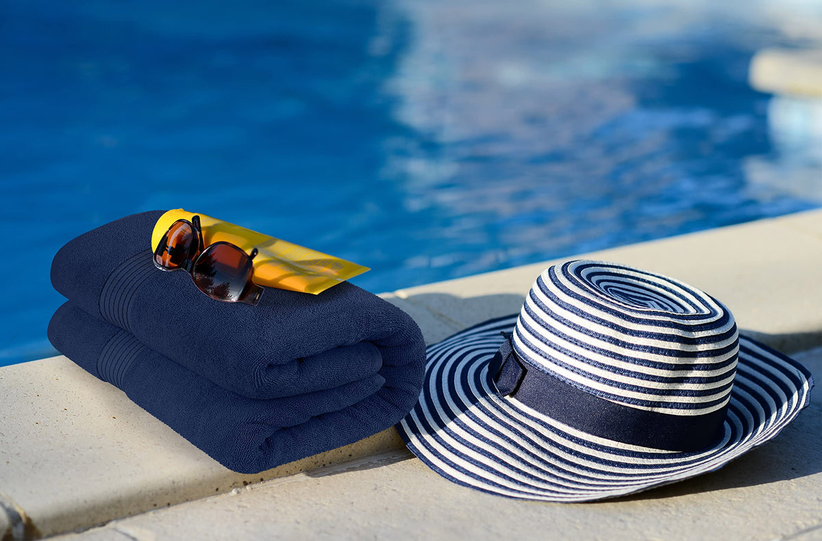 Utopia Towels bath sheet colorfast-navy display emphasizes fade-resistant design.
