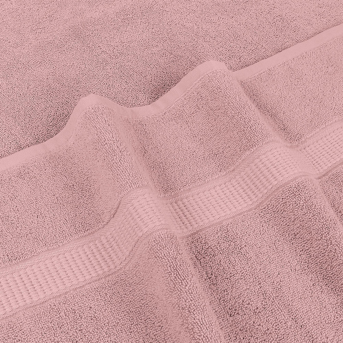 Utopia Towels poolside drying after swimming.