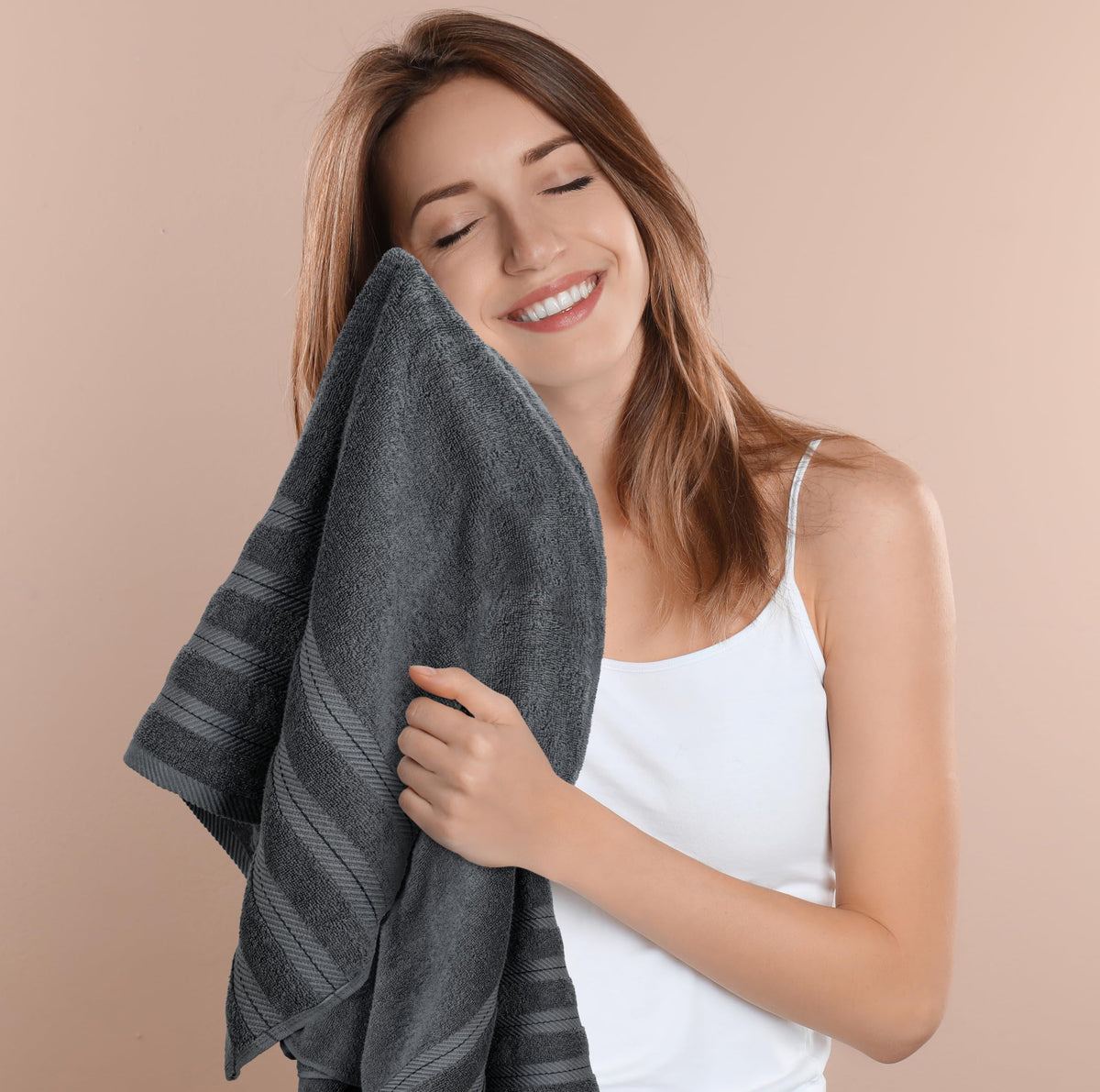 Utopia Towels hanging in bathroom scene showcase plush shade and warmth.