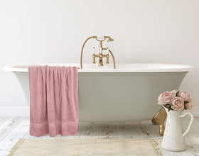 Utopia Towels care tag indicates simple washing guidelines.