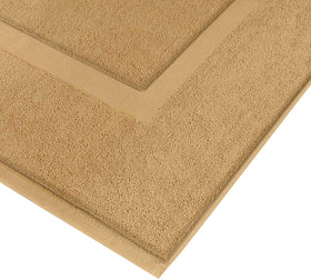 Two-sided design of Utopia Towels cotton banded rug for refreshed surfaces.