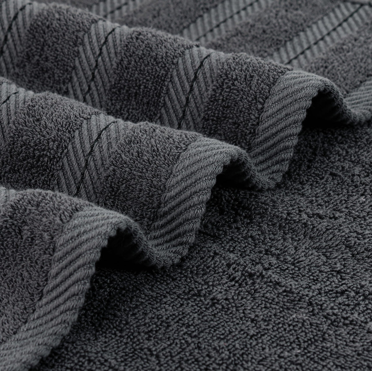 Utopia Towels daily-use towels folded neatly for a spa-like bathroom.