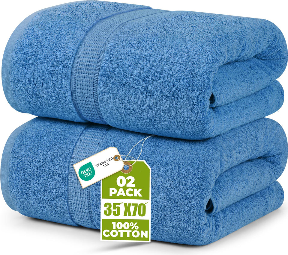 Utopia Towels jumbo bath sheet in electric blue, plush and extra-large for wrap-around comfort.