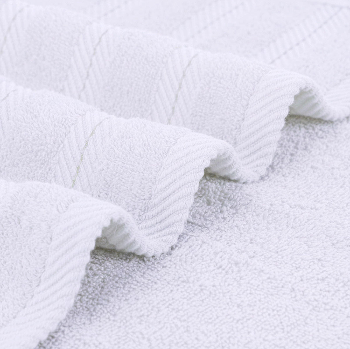 Utopia Towels machine washable with warm water and mild soap.