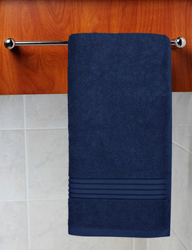 Utopia Towels navy towel in hotel scene, spa-like feel for guests.