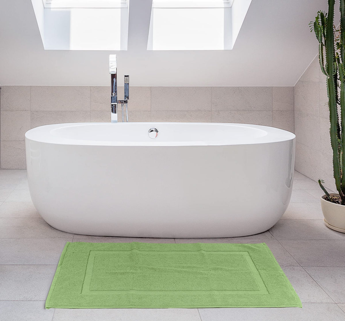 Utopia Towels roomy bath mat offers a soft landing after showers.