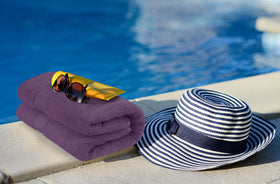 Utopia Towels 35x70 bathsheet in plum shown full coverage.