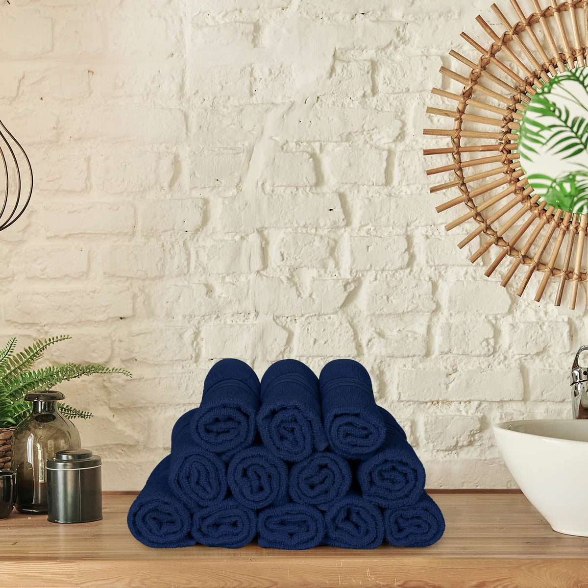 Utopia Towels navy washcloths in a bathroom setting illustrate versatile use.