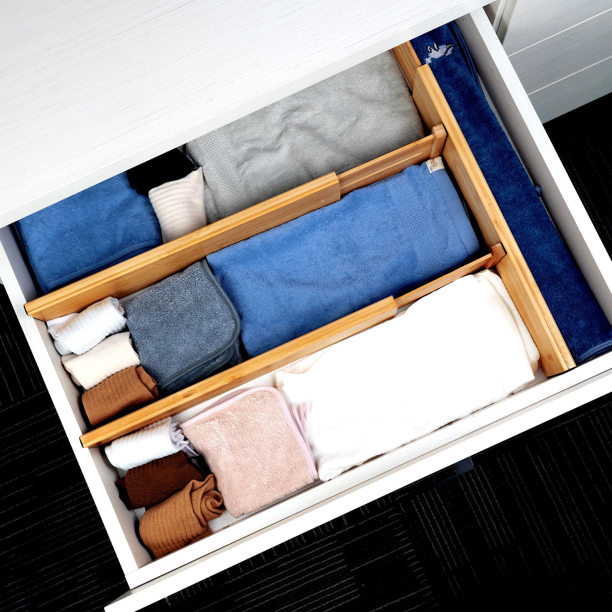 Utoplike bamboo divider with non-slip ends protects drawers and organizer items.