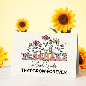 Uwingess desk-scene image shows an elegant teacher gift setup
