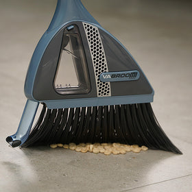 VaBroom built-in vacuum nozzle demonstrates dust and small particle collection.