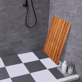 VaeFae teak shower mat smooth surface feels natural underfoot.
