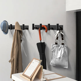 VAEHOLD bathroom-ready rack keeps towels and robes accessible without clutter.