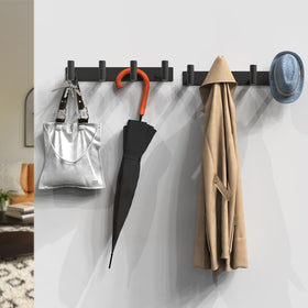 VAEHOLD wall rack with optimized hook spacing promotes ventilation and quick drying of items.