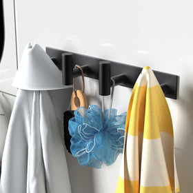 VAEHOLD coat rack with two-row design increases storage and accessibility in tight spaces.
