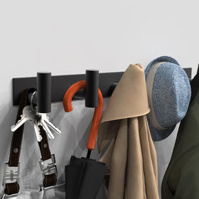 VAEHOLD multiuse hook rack shown in kitchen and bathroom setup for towels and essentials