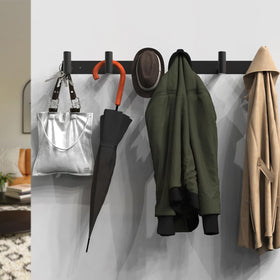 Stainless steel black finish on the VAEHOLD rack adds durable, modern style.