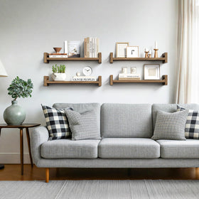Vailando living room decor on wall shelves adds natural warmth.