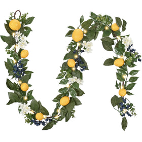 Valery Madelyn 6ft lemon garland on mantel with warm LEDs for cozy spring ambience.