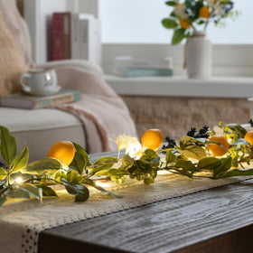 Valery Madelyn lemon garland used as a table runner for lemonade parties.