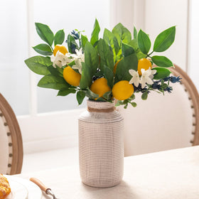 Valery Madelyn lemon picks styled on a kitchen table for sunny seasonal ambiance.