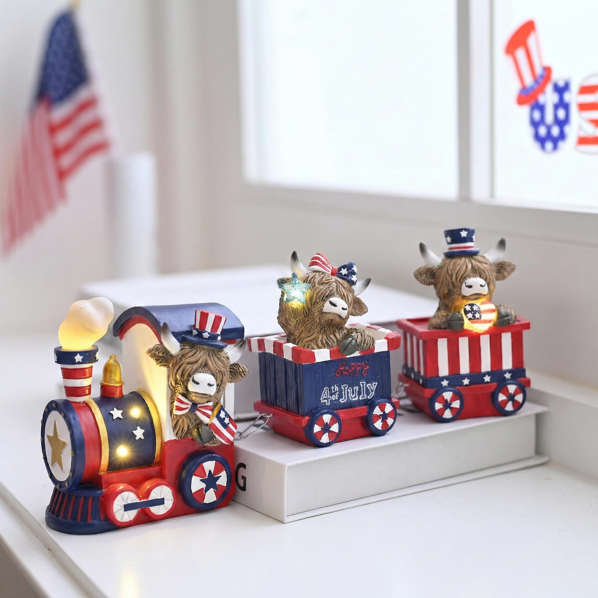 Valery Madelyn patriotic cow train collection with red white blue hues