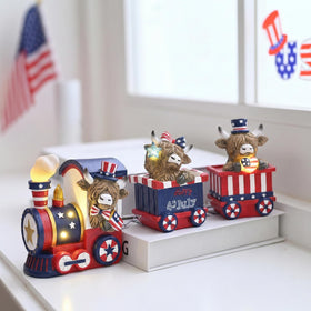 Valery Madelyn patriotic cow train collection with red white blue hues