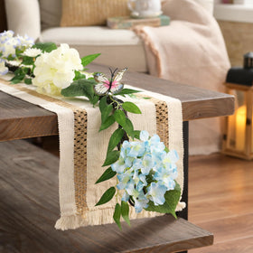 Garland illuminated by warm LED lights with timer option.