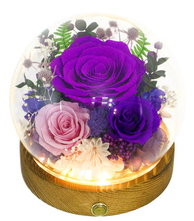 Valley of Rain and Forest dark purple and pink roses arrangement adds lasting color to any room