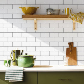 Vamos Tile dark gray grout close-up creates modern contrast with glossy white.