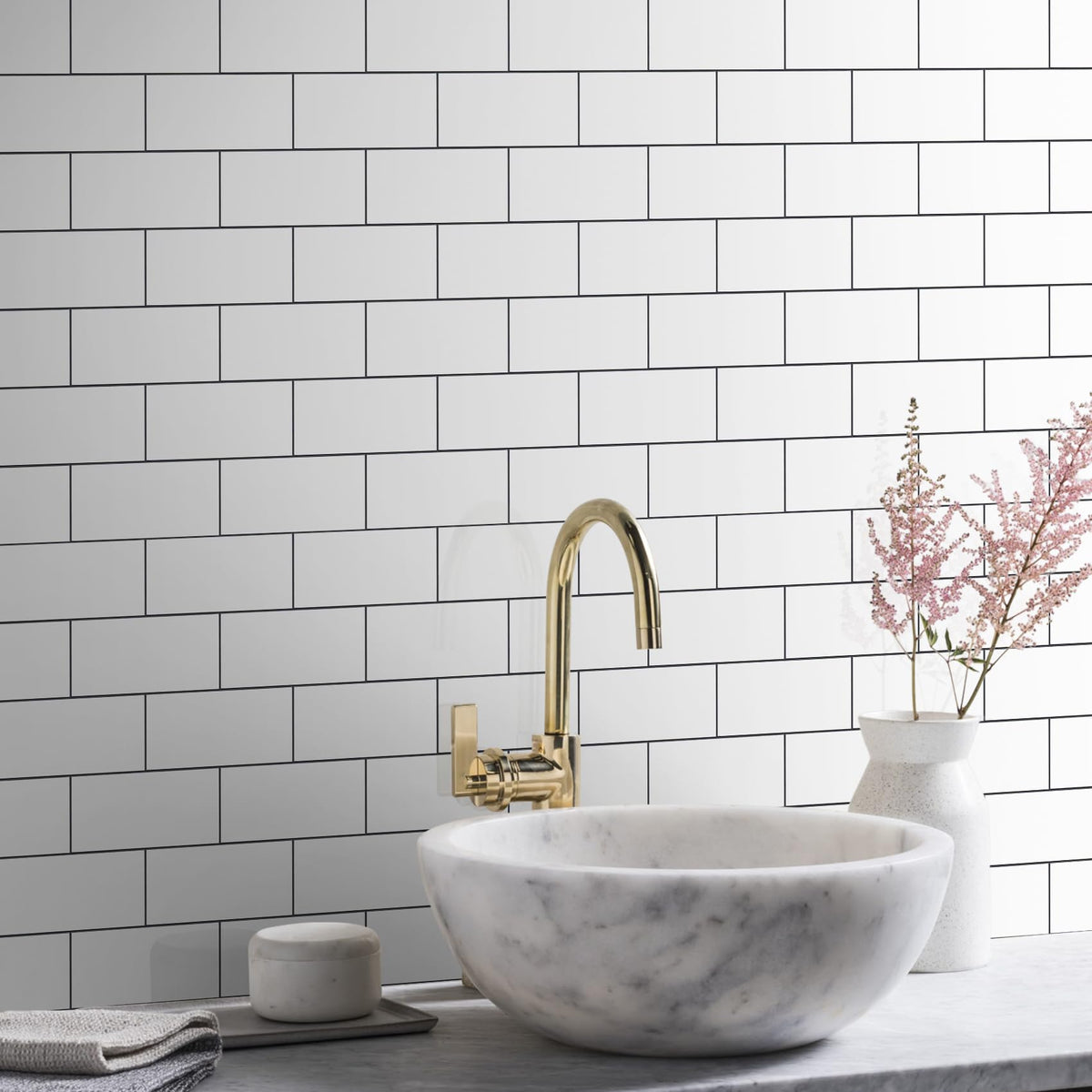 Vamos Tile packaging includes 100 self-adhesive tiles for full project coverage.