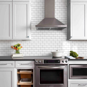 Vamos Tile peel-and-stick detail demonstrates strong, mess-free installation.