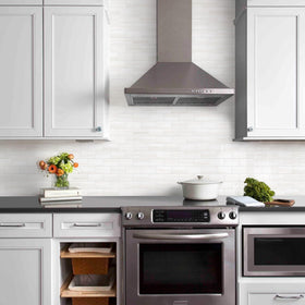 Vamos Tile peel-and-stick installation demonstrates easy DIY wall application.