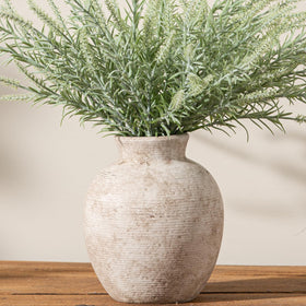 Vanselia ceramic flower vase with handcrafted texture adds rustic charm.