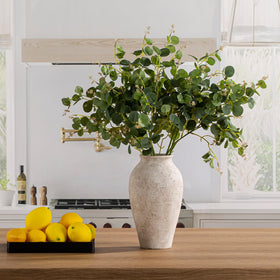Vanselia vase on shelf adds texture and charm to book-filled spaces