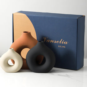 Vanselia handcrafted ceramic vase in rust with a sturdy build.