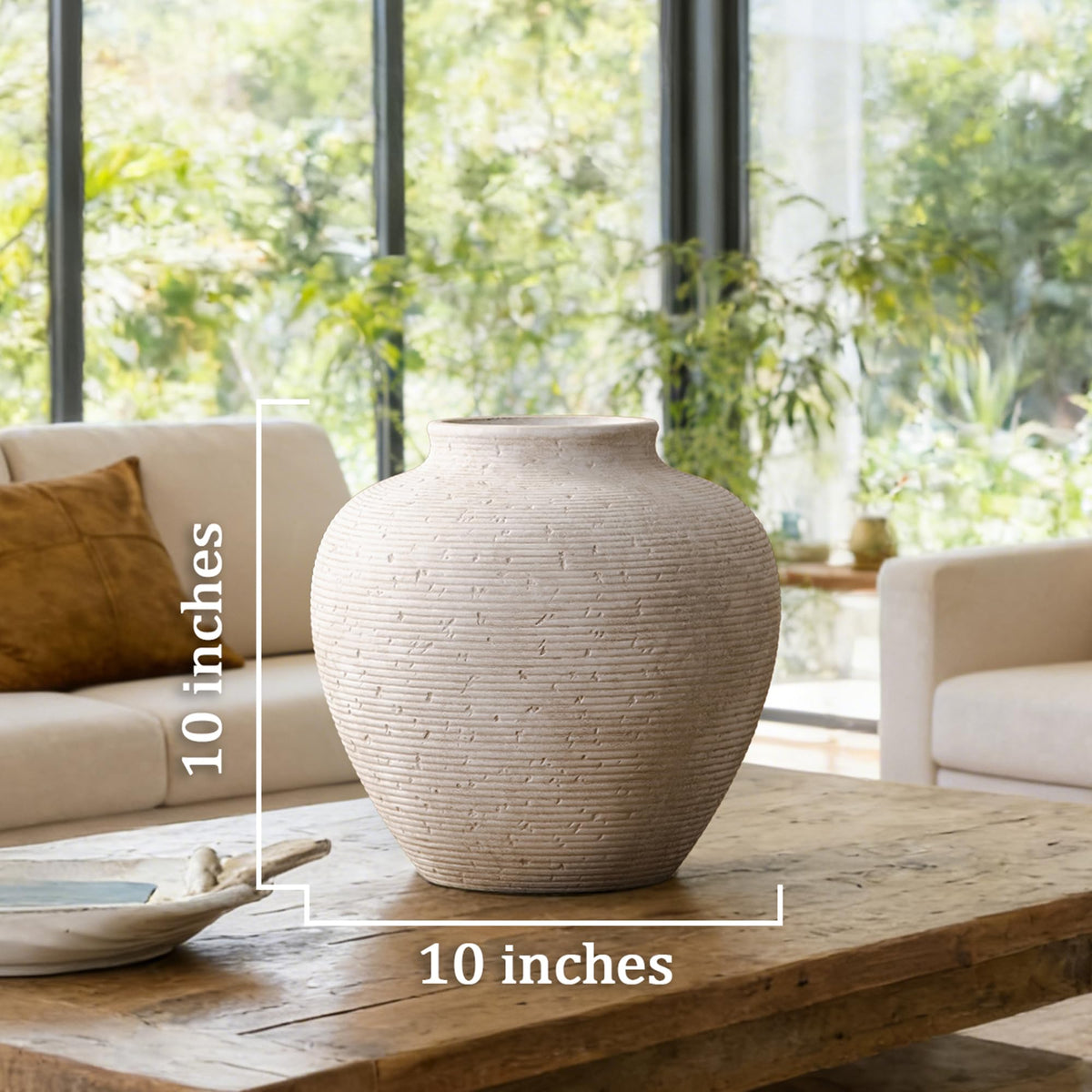 Vanselia handcrafted ceramic vase adds character with subtle variations in texture.