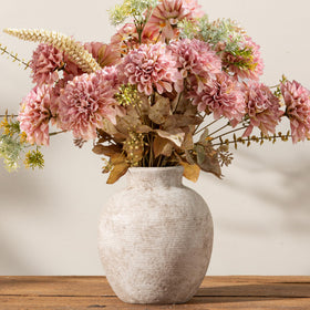 Vanselia vase supports fresh or artificial flowers for versatile styling.