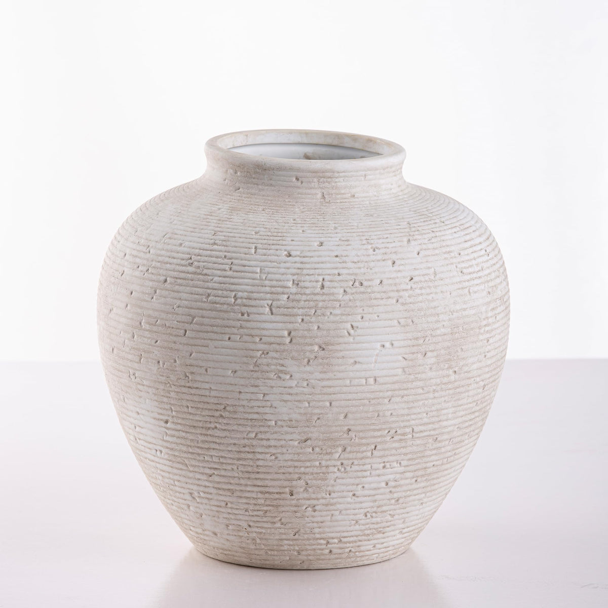 Vanselia large tall vase highlights textured ceramic for farmhouse and rustic spaces.
