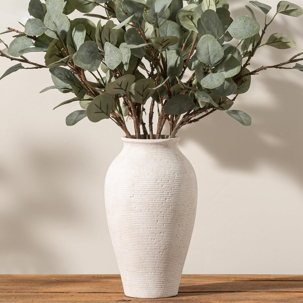 Vanselia tall vase bottom includes non-slip pad to protect surfaces