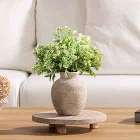 Vanselia vase base includes a non slip pad to protect surfaces