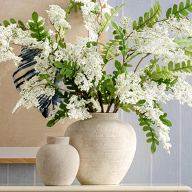Vanselia vase blends with furniture and shelves for stylish styling.
