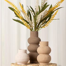 Vanselia vase base features non-slip design to protect surfaces.