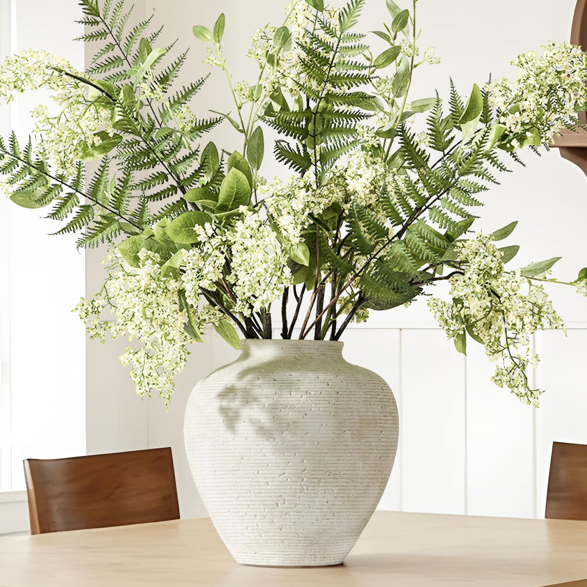 Vanselia vase with waterproof interior supports water for fresh flowers.