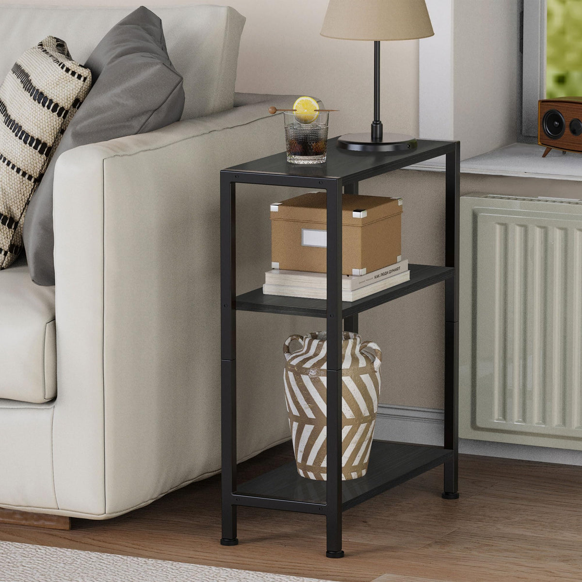 Vantimo black end table with slim profile beside sofa complements modern decor.