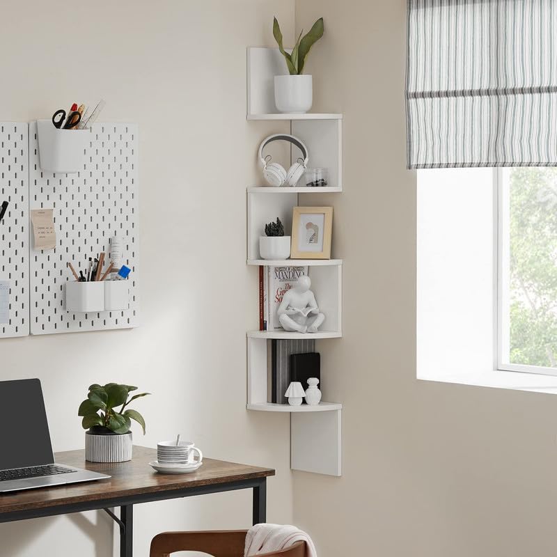 VASAGLE 5-tier shelf in living room organizes books and décor elegantly.