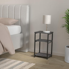 VASAGLE Barnet end table 3-tier storage keeps essentials organized beside sofa.